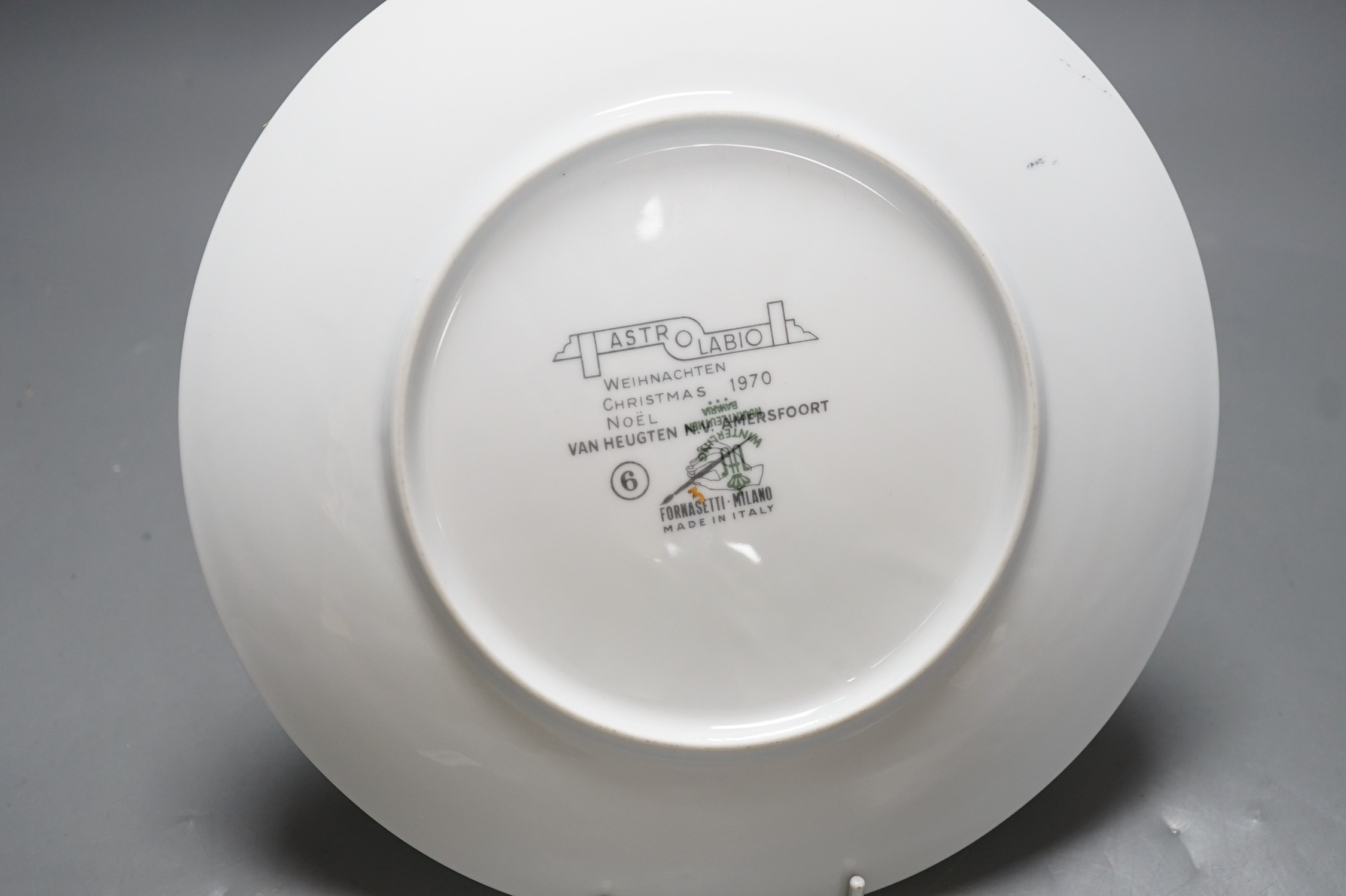 A Fornasetti ‘Astrolabio’ porcelain 1970 Christmas plate, 24cm diameter 24cm